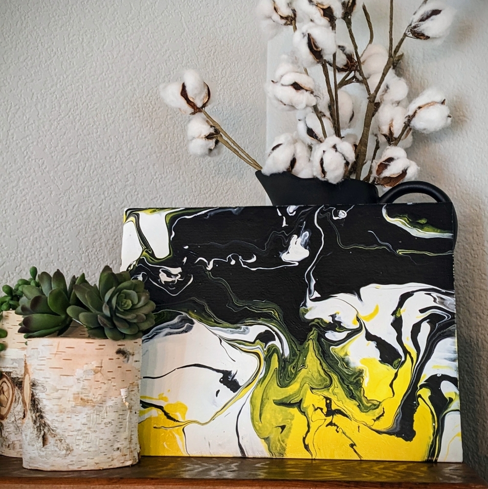 Yellow, black, white pour painting